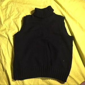 Black knit turtleneck sweater vest